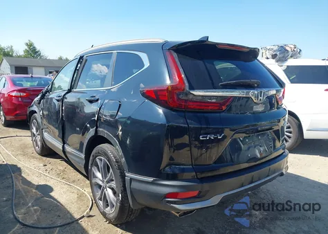 2021 Honda Cr-V Awd Touring z USA, uszkodzony, nr VIN 5J6RW2H94ML004555